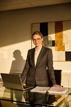 Businesswoman in suit and glasses