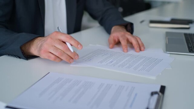 Close up unrecognizable man writing business report paperwork male hands signing work documents at office businessman write corporate education instruction client with insurance bank credit contact