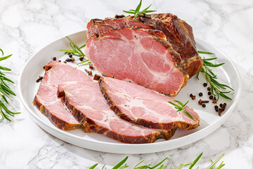 Fototapeta premium Naturally cured pork coppa roast is on a plate