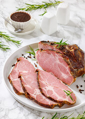 Fototapeta premium Naturally cured pork coppa roast is on a plate