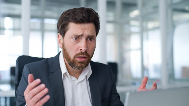 Disappointed Caucasian mature business man losing receive laptop notification e-mail bad news middle-aged businessman 40s male company CEO lost failure with cyberspace upset reaction at office table