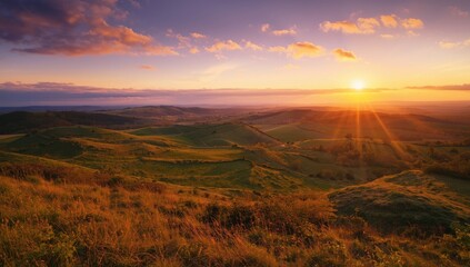 Obraz premium Hills and bright sunset sky during a warm spring evening landscape