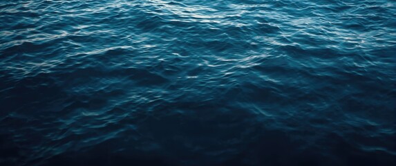 Obraz premium Dark rippling water surface background