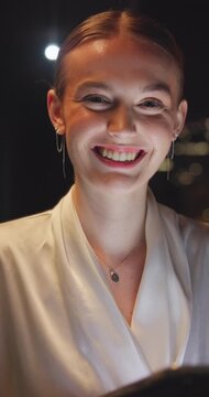 Night, face and businesswoman in office with tablet, deadline or paralegal for lawsuit administration. Bokeh, happy person and law clerk in firm with tech, online research or work late for court case