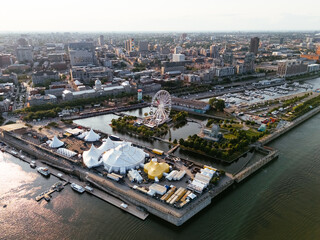 Obraz premium Drone view of Old Port City waterfront park with an entertainment venue. Montreal, Canada