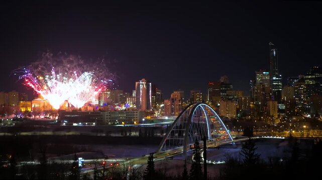 Spectacular Fireworks Over Edmonton Skyline and Walterdale Bridge at Night