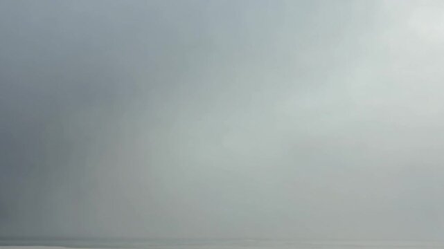 Moody grey overcast sky with thick fog and heavy clouds