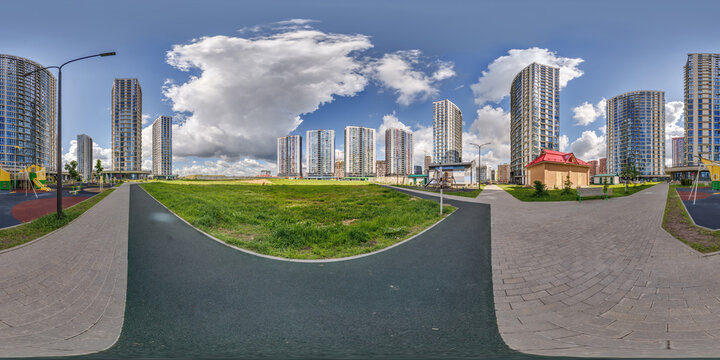 hdri 360 panorama near new skyscrapers and residential complex in full equirectangular seamless spherical projection