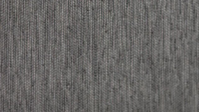 Slow Vertical Pan Across Grey Woven Fabric Texture Background