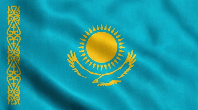 National flag of kazakhstan with a golden sun and eagle on a blue background