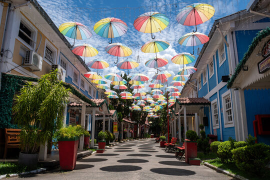 Little Finland in Penedo delights visitors with colorful umbrellas that create a vibrant setting. Penedo &ndash; Rio de Janeiro.