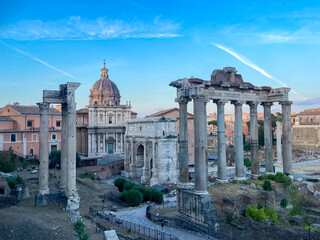 Naklejka premium Ancient Roman Forum ruins with Temple of Saturn and Septimius Severus Arch