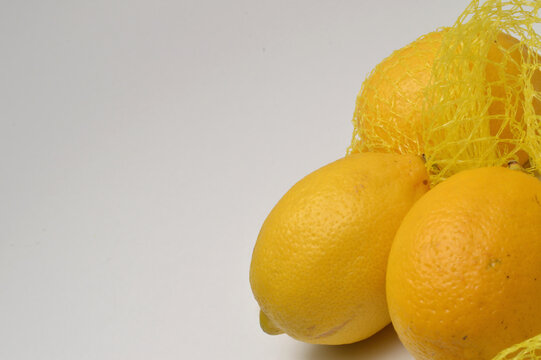 lemons on a white background close up with generous copy space, horizontal composition border layout