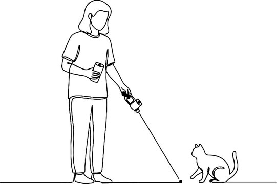 Woman using laser pointer with curious cat nearby.