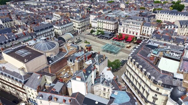 Titled drone fly toward the Angers cultural city center on the Place du Ralliement with municipal Grand Theatre, Maine-et-Loire, France