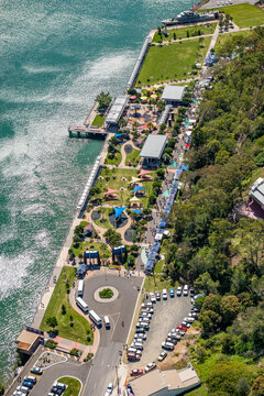 Waterfront promenade with lawns, gazebos and community gathering