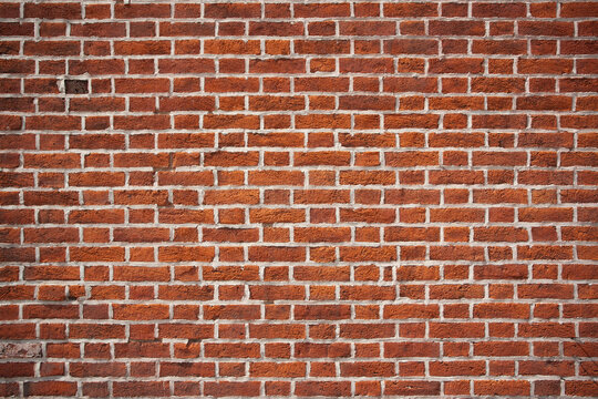 Close-up of red brick wall