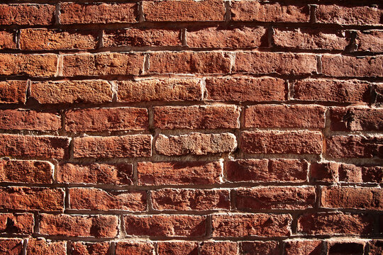 Close-up of red brick wall