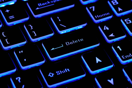 Close-up of laptop keyboard with Delete key