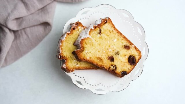 Slices of fruitcake on a white doily