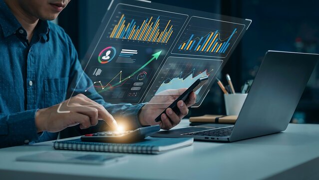 Financial Analyst Using Digital Technology and Calculator to Review Growth Data and Stock Market Trends for Corporate Investment Strategy