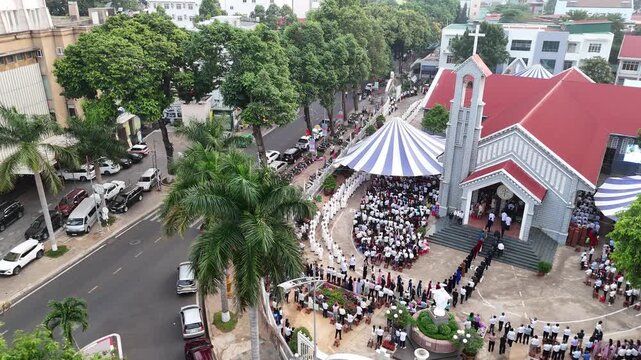 Drone Reveal of Priests and Newly Ordained Priests Procession Entering Buon Ma Thuot Cathedral During Ordination Ceremony