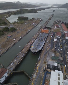 Aerial view, cargo ship at the lock in the Panama Canal from above, Mirador Miraflores, Panama