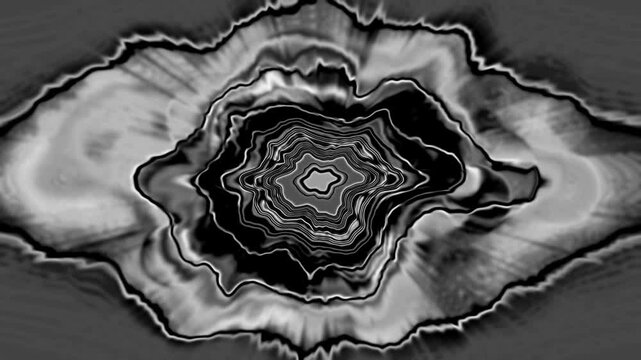 An intricate black and white abstract pattern featuring layered contours that resemble mountain landscape formations, creating a visually striking and artistic design.