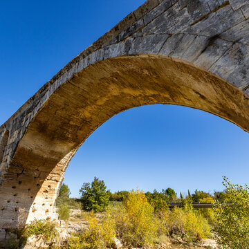 Low angle view of 3rd century Roman bridge, Pont Julien, on sunny day