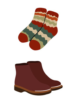 Wool socks and ankle boots footwear set hand drawn illustration isolated on transparent background