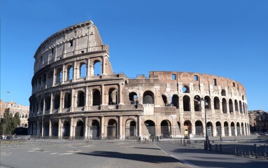 Fototapeta premium Explore the majestic Roman Colosseum, a symbol of ancient architecture. This iconic structure showcases timeless beauty. Perfect for travel enthusiasts and history lovers. AI.