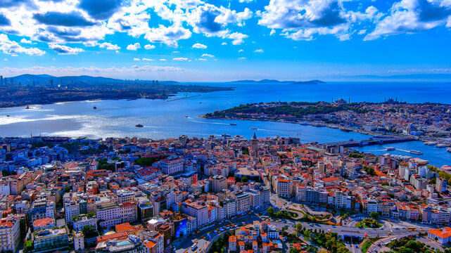 Aerial drone view of Istanbul from Galata Tower toward Golden Horn, Hagia Sophia, Bosphorus Strait and Marmara Sea, Turkey