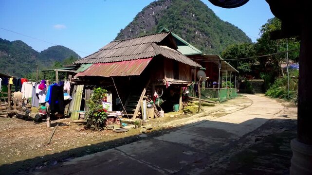 Traditional stilt house in a remote village of Pu Luong, Vietnam, scenic rural landscape with authentic architecture and lush green surroundings.
