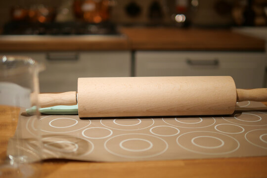 Rolling pin on table in kitchen during cooking time