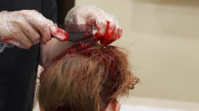 Mother colors teenage daughter's hair red