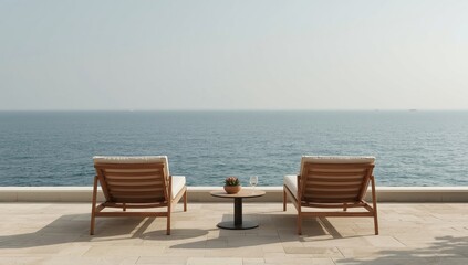 Fototapeta premium Lounge chairs facing the ocean on a sunny day