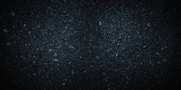 Dark textured asphalt surface background