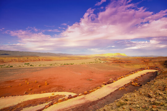 Beautiful desert landscape with cloudy sky. Makhtesh Ramon Crater, Israel