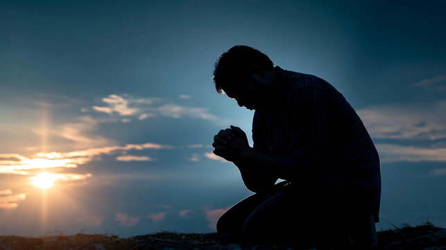 silhouette of man praying by cross at dramatic purple sunset, christian faith worship devotion spiritual concept