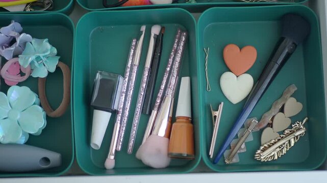 Organizing makeup tools in a drawer
