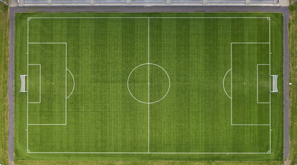 Aerial view of a perfectly manicured green soccer field © DANG QUANG