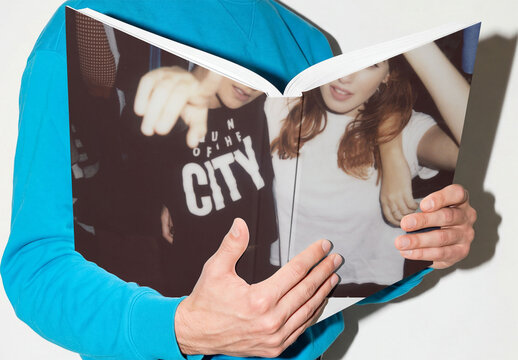 Mockup of Book Held by Person