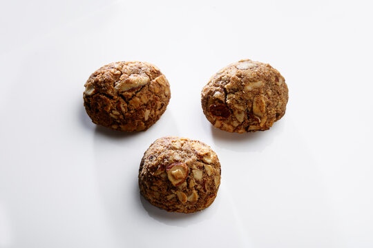 Indian snacks called ragi badam cookies isolated on white background 