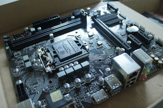Modern computer motherboard with LGA1151 processor socket. July 27, 2019, in Sukoharjo, Indonesia