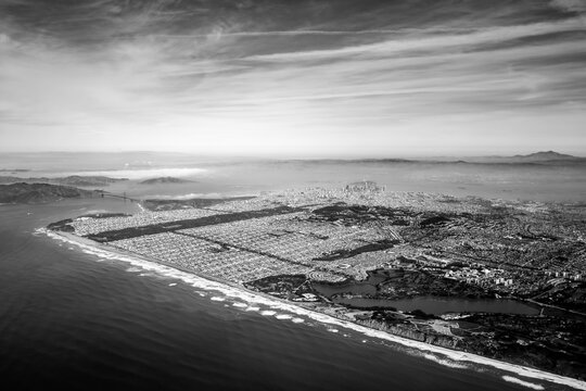 view from the plane of the Golden Gate bridge and San Francisco Bay Area in California
