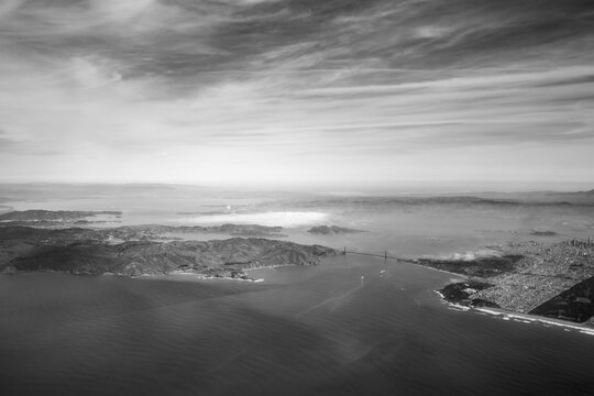 view from the plane of the Golden Gate bridge and San Francisco Bay Area in California
