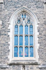 Naklejka premium Colonial window and stone wall, Toronto, Canada