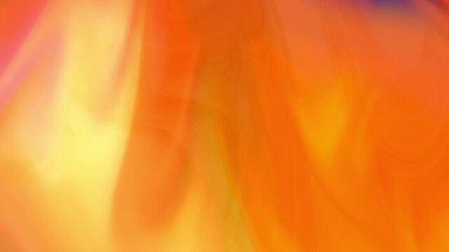 Radiant orange and yellow gradient motion featuring smooth luminous light transitions and flowing textures. Energetic animated background perfect for summer themes, branding, and motion graphics