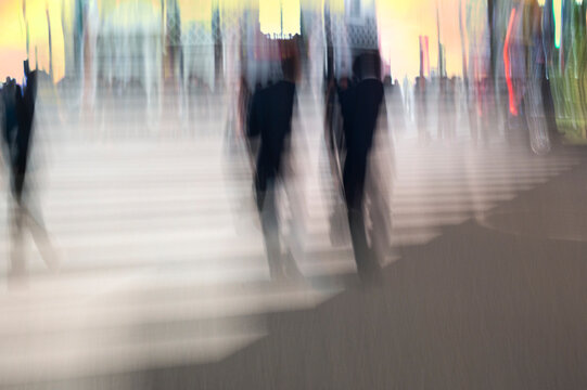 Blurred Pedestrians on Urban Crosswalk
