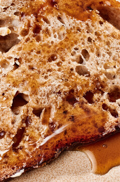 Slice of bread with honey